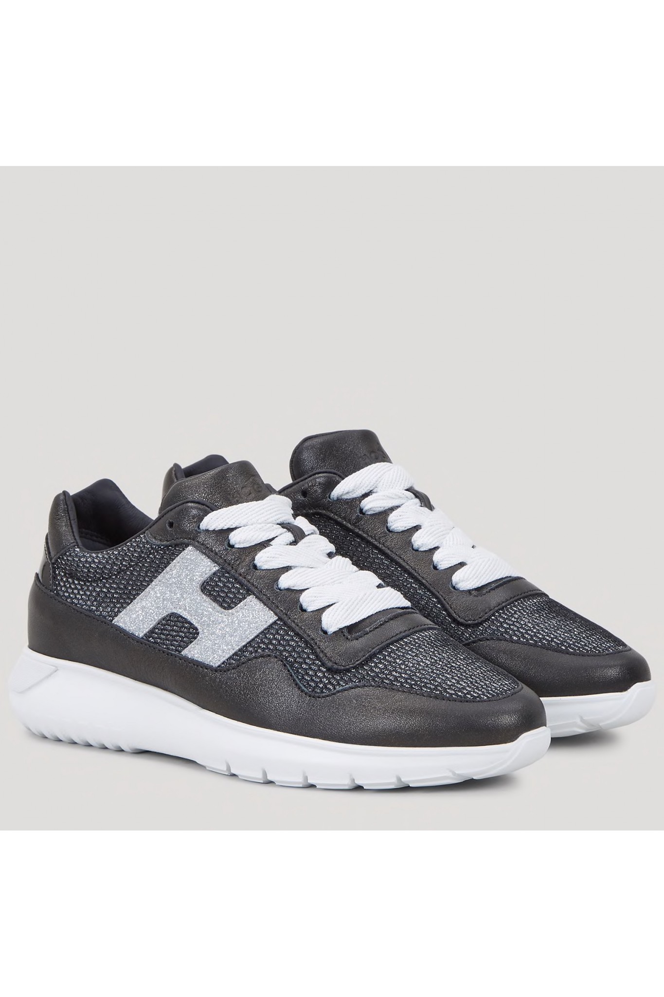 Shop online Hogan Interactive³ sneakers in black leather and technical ...